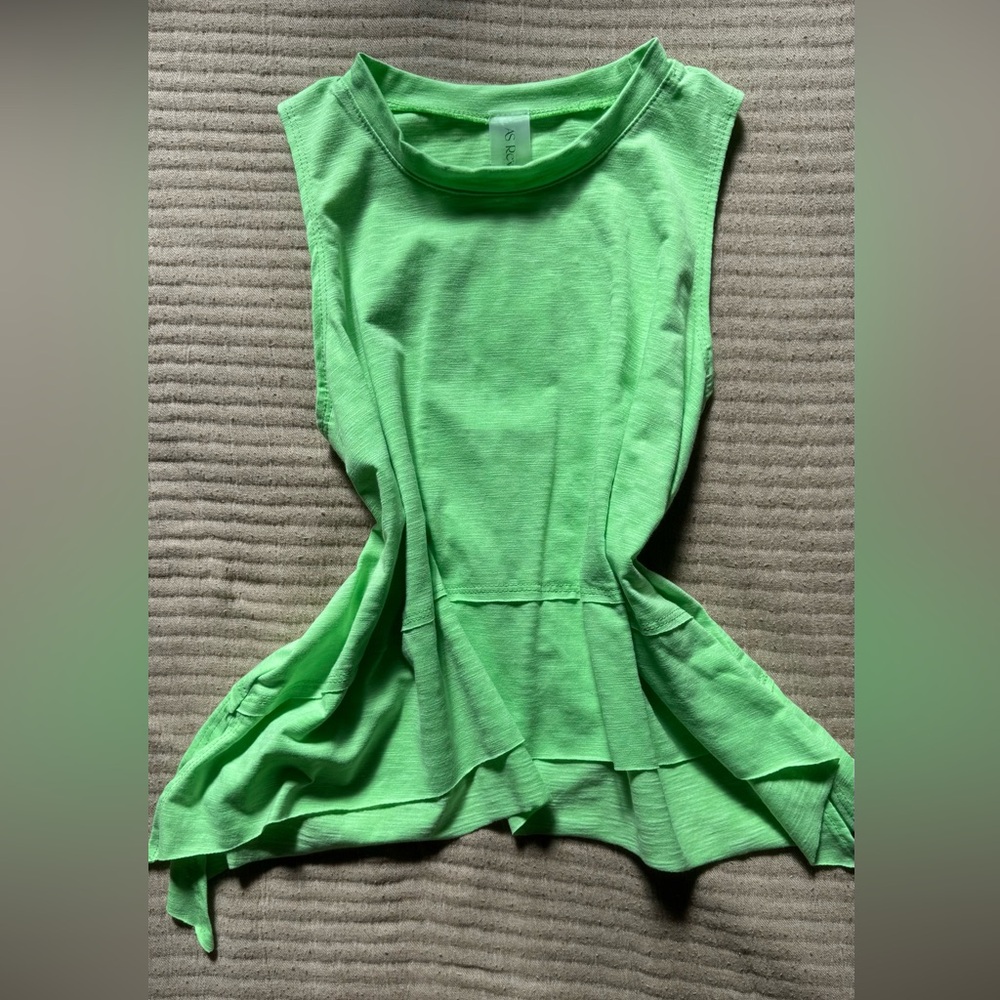 Green tank. Longer on sides. Very Flattering